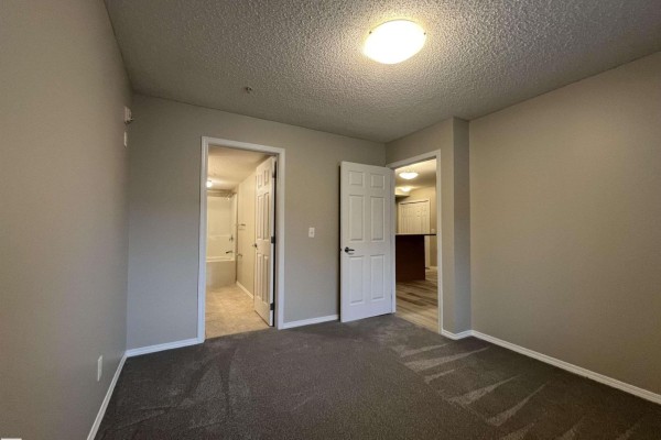 Primary Bedroom - #102 6921 199 St Nw, Edmonton, AB T5T3X7 Photo 4