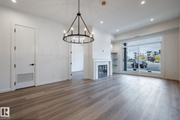 Kitchen - #102 7459 May Common Nw, Edmonton, AB T6R0X6 Photo 3