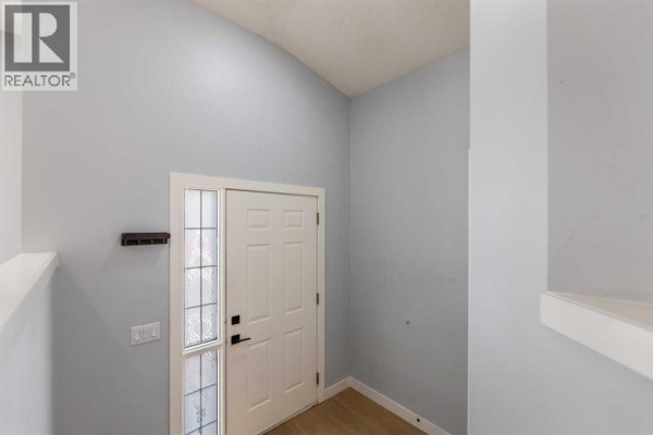 Living room - 102 Martin Crossing Grove Ne, Calgary, AB T3J3M5 Photo 5