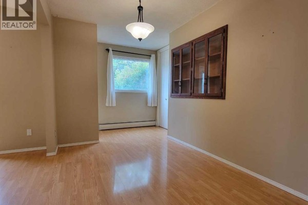 Dining room - 10215 106 Avenue, Grande Prairie, AB T8V1K2 Photo 2