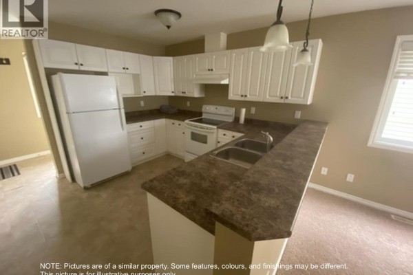 Mud room - 10247 102 Avenue, Fort St  John, BC V1J2E4 Photo 5