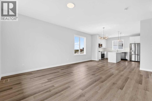 Living room - 1025, 132 Red Embers Link Ne, Calgary, AB T3N2X8 Photo 2
