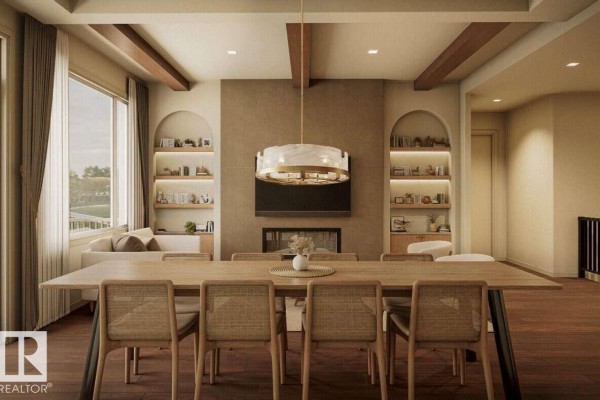 Formal dining room with a long wooden table, chairs, fireplace, and built-in shelving. - 10252 92a, Morinville