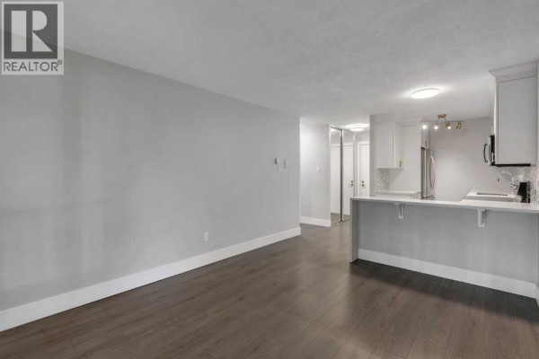 Living room - 103, 1015 14 Avenue Sw, Calgary, AB T2R0N9 Photo 3