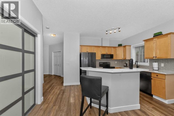 Kitchen - 103, 4718 Stanley Road Sw, Calgary, AB T2S2R2 Photo 5