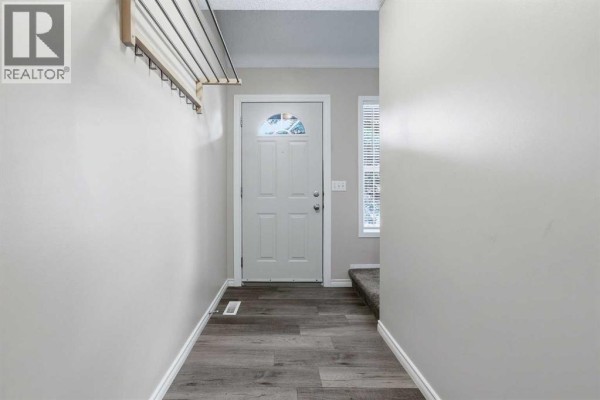 Living room - 103, 760 Railway Gate Sw, Airdrie, AB T4B3C5 Photo 5