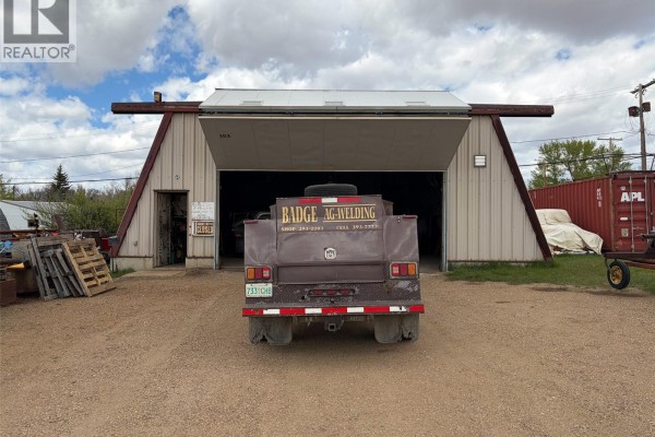Rear view of utility truck with diamond plate and equipment in workshop - 103 - 105 1st Avenue W, Climax