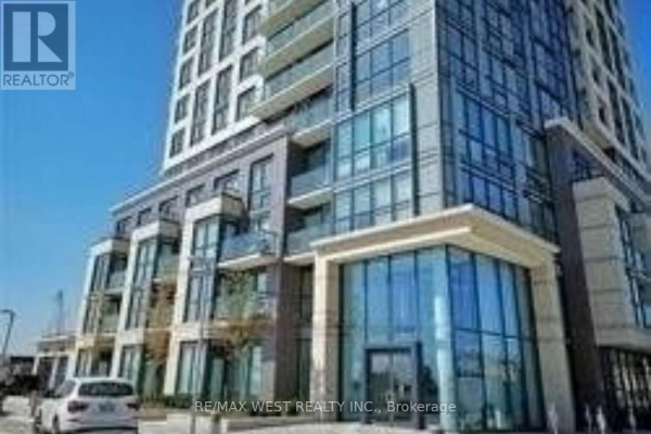 Exterior view of a tall, contemporary apartment building with balconies and large windows. - 103 - 20 Thomas Riley Road, Toronto