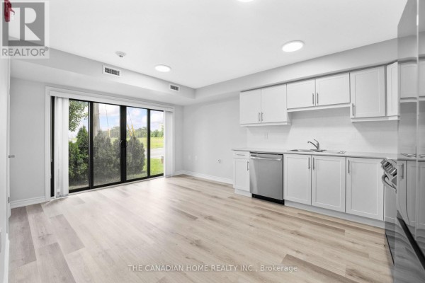 Living room - 103 - 63 Vine Street S, St  Catharines, ON L2R3X9 Photo 4