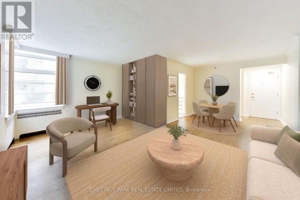 Virtually staged living room and dining area with furniture, light beige walls, and hardwood floors. - 103 - 717 Eglinton Avenue W, Toronto