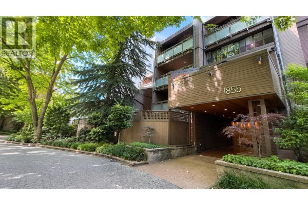 Exterior of the apartment building at 1855 Nelson Street with covered entrance. - 103 1855 Nelson Street, Vancouver