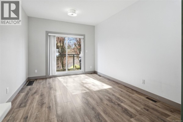 Bedroom - 103 687 Strandlund Ave, Langford, BC V9B3G2 Photo 5
