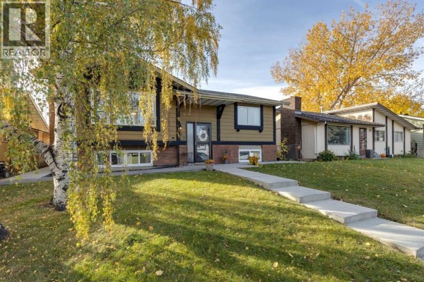 Den - 103 Dovercrest Way Se, Calgary, AB T2B2L8 Photo 4