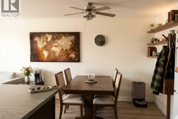 Living room - 1036 Grey Avenue, Crossfield, AB T0M0S0 Photo 5
