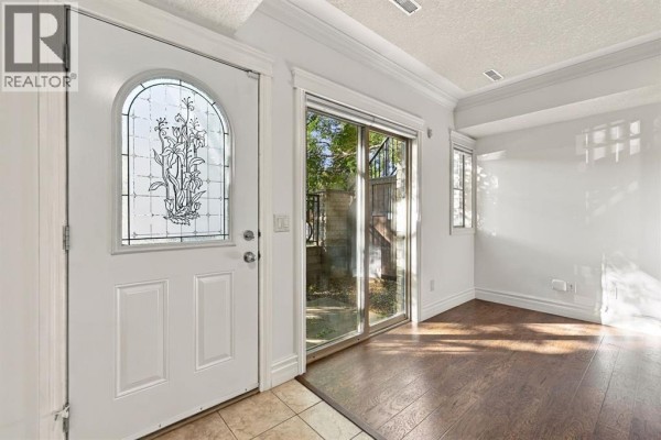 Bedroom - 104, 1728 35 Avenue Sw, Calgary, AB T2T2C9 Photo 5