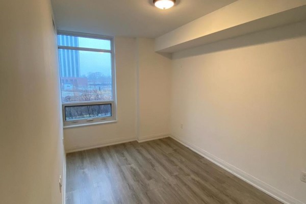 Bright room with a window and view of the outside area - 104 - 30 Gibbs Road, Toronto