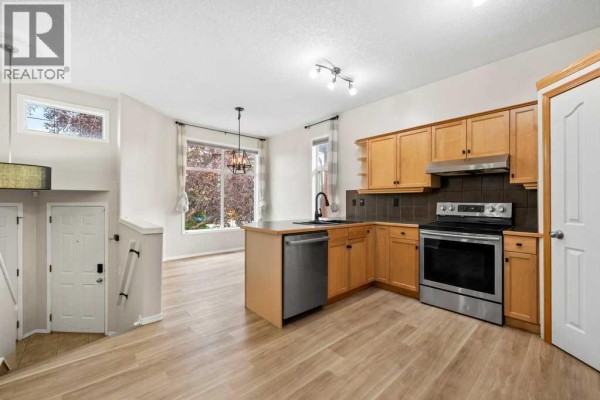 Bedroom - 104 Springs Place Se, Airdrie, AB T4A2C9 Photo 5