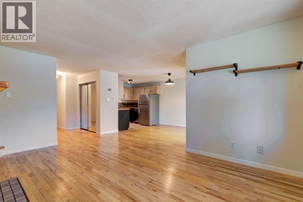 Living room - 105, 200 Three Sisters Drive, Canmore, AB T1W2M1 Photo 5