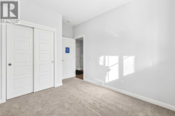 Living room - 105, 28 Red Embers Plaza Ne, Calgary, AB T3N2W1 Photo 3