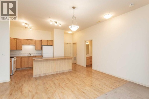 Bedroom - 105, 4425 Heritage Way, Lacombe, AB T4L2P4 Photo 3