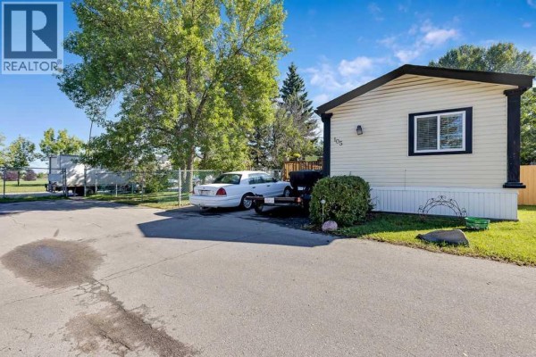 Living room - 105, 6724 17 Avenue Se, Calgary, AB T2A0W5 Photo 2