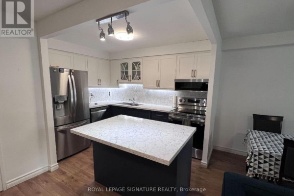 Kitchen - 105 - 5 Shady Golfway, Toronto, ON M3C3A5 Photo 3