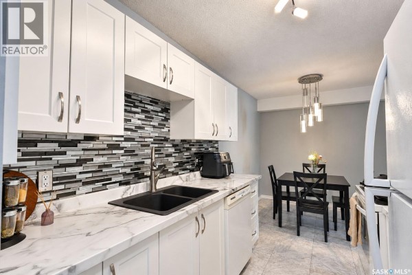 Living room - 105 1580 Olive Diefenbaker Drive, Prince Albert, SK S6V7M6 Photo 3