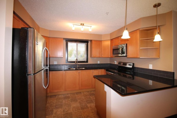 Bedroom 2 - #105 3719 Whitelaw Ln Nw, Edmonton, AB T6W2C3 Photo 5