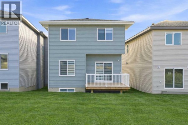 Bedroom - 105 Heritage Boulevard, Cochrane, AB T4C3G8 Photo 5