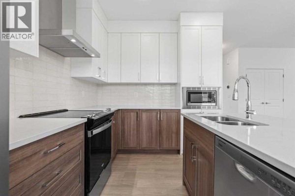 Kitchen - 1059 Thimbleberry Hill Sw, Airdrie, AB T4B5S1 Photo 4