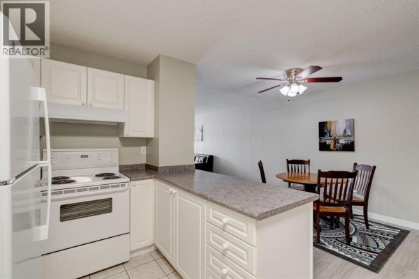 Kitchen - 106, 659 4 Avenue Ne, Calgary, AB T2E0J9 Photo 4