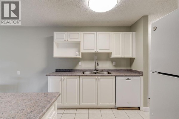 Living room - 106, 659 4 Avenue Ne, Calgary, AB T2E0J9 Photo 5