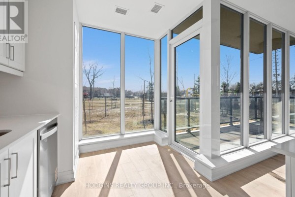 Living room - 106 - 1035 Southdown Road, Mississauga, ON L5J0A2 Photo 4