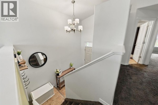 Kitchen - 106 25 Street, Springbrook, AB T4S0J1 Photo 5