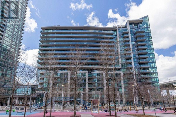 Front facade of a contemporary condo building with balconies and glass windows. - 1062 - 209 Fort York Boulevard, Toronto