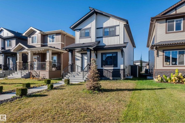 Family room - 10624 98 St, Morinville, AB T8R2P2 Photo 4