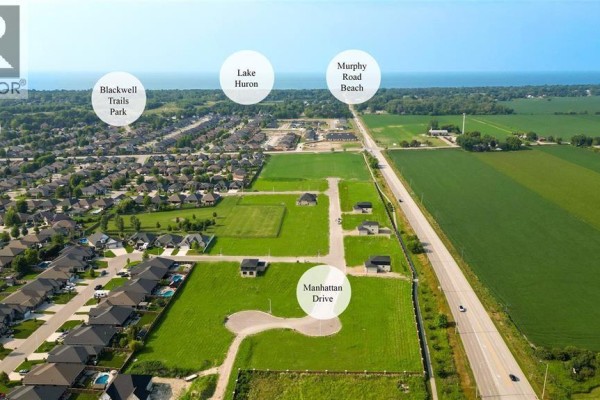 Aerial view shows Manhattan Drive development near Blackwell Trails Park and Lake Huron. - 1065 Manhattan Drive, Sarnia