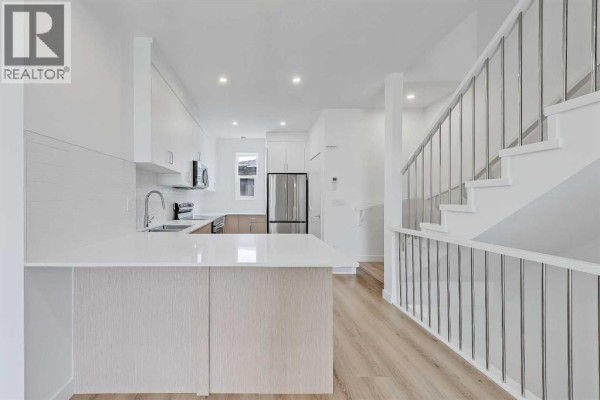 Dining room - 107, 3550 45 Street Sw, Calgary, AB T3E3V2 Photo 3