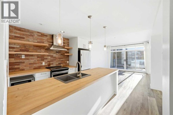 Primary Bedroom - 107, 540 34 Street Nw, Calgary, AB T2N2X7 Photo 4