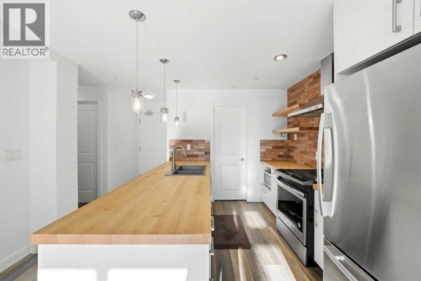 Laundry room - 107, 540 34 Street Nw, Calgary, AB T2N2X7 Photo 5