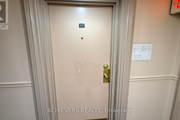 Close-up of apartment door numbered 107 - 107 - 640 Grey Street, Brantford