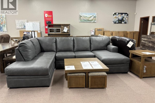 Interior view of a retail store with aisles of furniture, shelves, and lighting. - 107 & 116 Brown Street, La Ronge