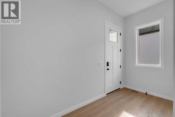 Primary Bedroom - 107 Bartlett Row Se, Calgary, AB T3M2N8 Photo 2