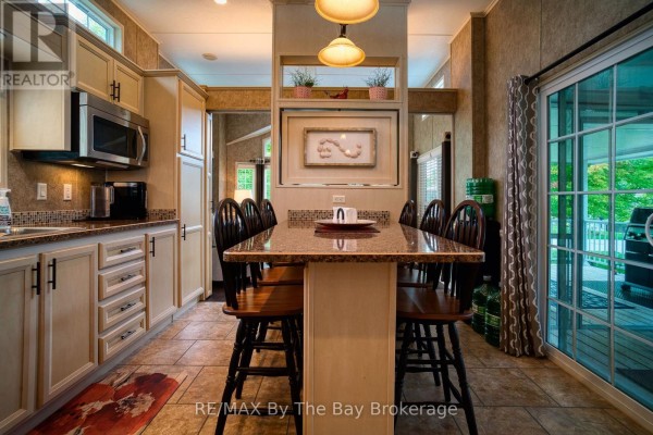 Sunroom - 107 Madawaska Trail, Wasaga Beach, ON L9Z1X7 Photo 5