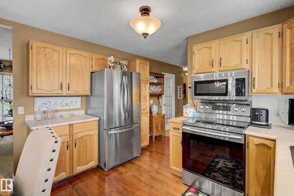 Primary Bedroom - 10715 50 St Nw, Edmonton, AB T6A2E3 Photo 5