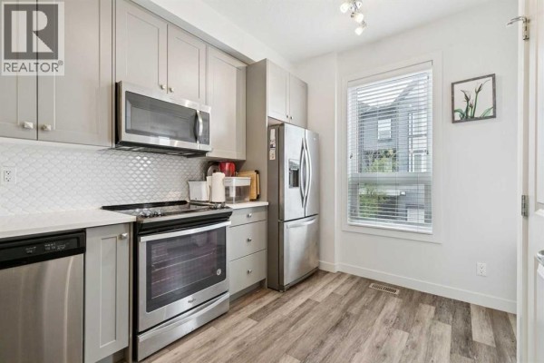 Laundry room - 108, 11 Evanscrest Mews Nw, Calgary, AB T3P0Y1 Photo 5