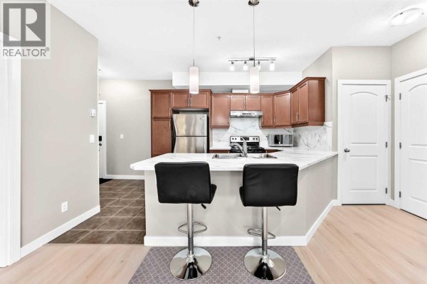 Primary Bedroom - 108, 15304 Bannister Road Se, Calgary, AB T2X0M8 Photo 5