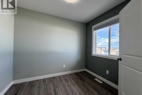 Primary Bedroom - 108, 6300 58a Street, Rocky Mountain House, AB T4T0C2 Photo 5