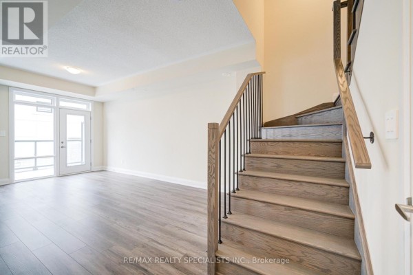 Bedroom 2 - 108 - 1573 Rose Way, Milton, ON L9T7E7 Photo 5