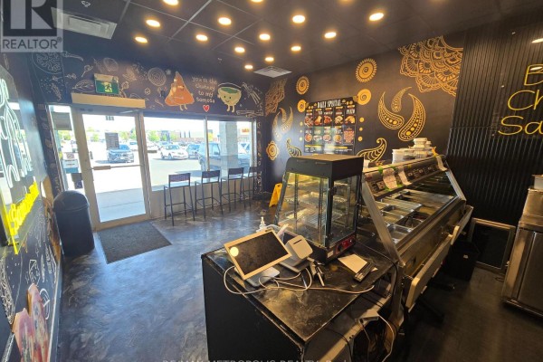 Commercial kitchen equipment including ranges, griddle, and deep fryers with stainless steel finishes. - 108 - 2377 Highway 2, Clarington